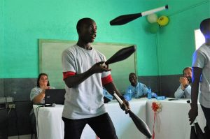 A youth from Lakay performs during the ceremony